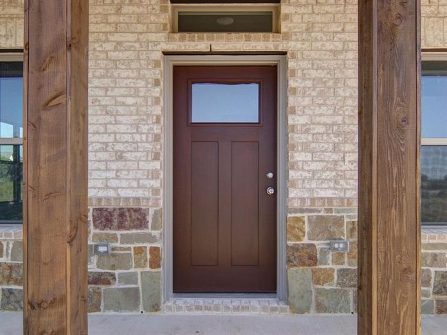 Basically zero maintenance landscaping looks amazing with natural rocks and native grasses. | Image 6