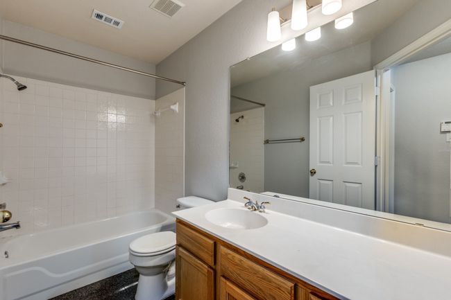 2nd full bath with shower / bath combination and vanity | Image 19