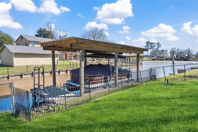Boat house easily holds a pontoon. Or buy this one! | Image 25