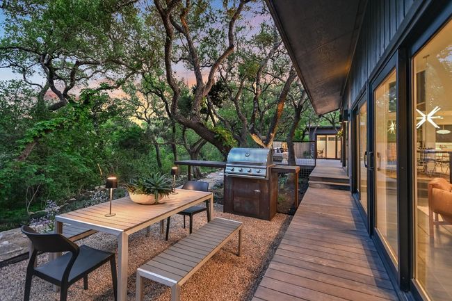 Deck with outdoor dining area and a built-in Blaze grill with infrared burner | Image 23