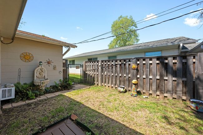 View of yard featuring fence | Image 28