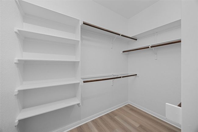 Spacious primary closet | Image 13