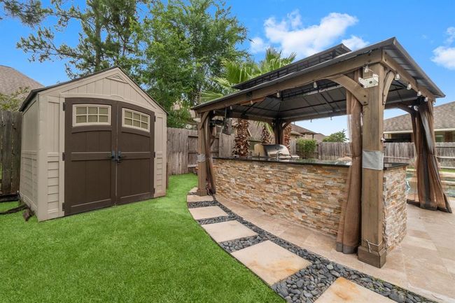 Storage shed and outdoor kitchen | Image 36