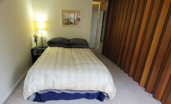 View of bed space from windows with divider closed | Image 17