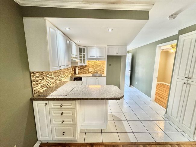 View from dinette to kitchen and bedrooms | Image 13