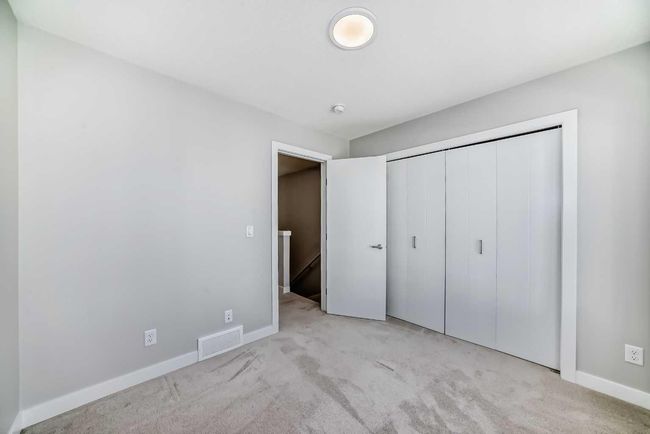 207 Evanscrest Square Nw, Townhouse with 2 bedrooms, 3 bathrooms and 1 parking in Calgary AB | Image 24