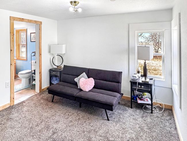 Main floor bedroom also has entry to bathroom | Image 16