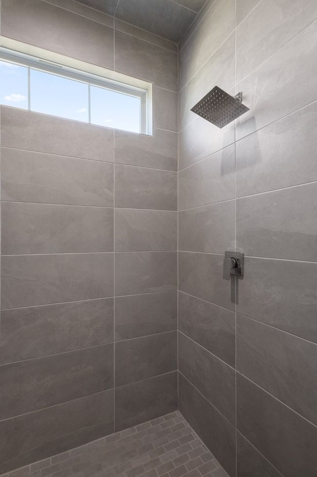 Full bathroom with a tile shower | Image 26