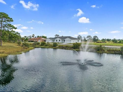630 Falls Ln, LEHIGH ACRES, FL, 33974-5975 | Card Image