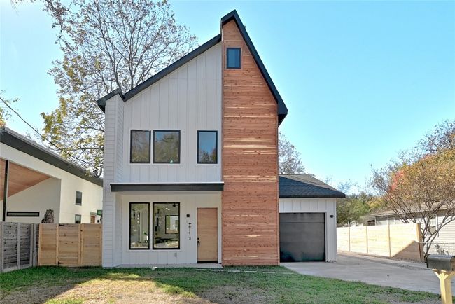 View of front facade featuring a garage | Image 22