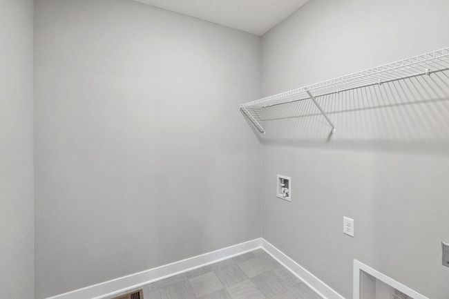 Bedroom level laundry. Model home. Options and colors will vary. | Image 24