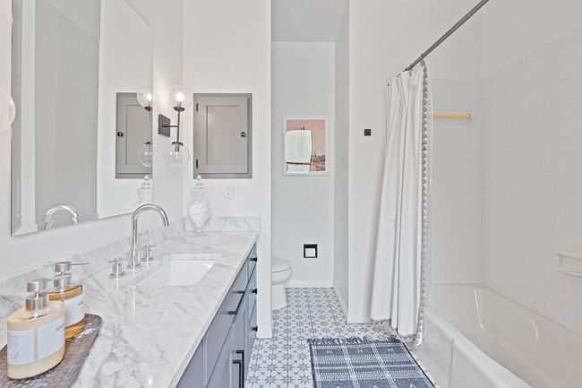 Private guest bathroom with access to outside can also be utilized as pool bathroom. | Image 26