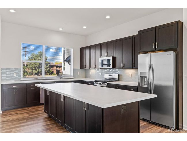 5173 Vivian St, Townhouse with 4 bedrooms, 3 bathrooms and null parking in Wheat Ridge CO | Image 14