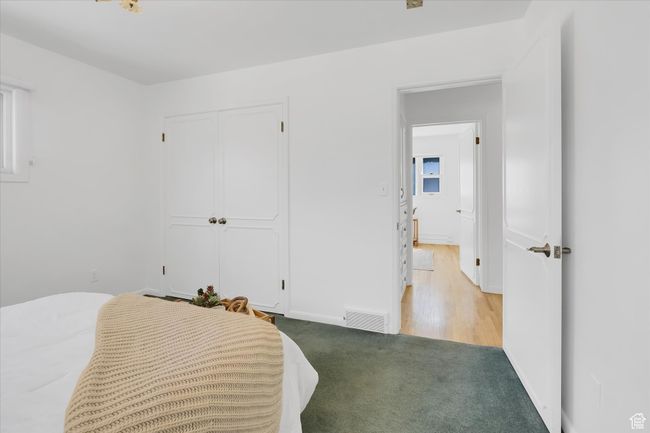 Carpeted bedroom featuring a closet and baseboards | Image 15