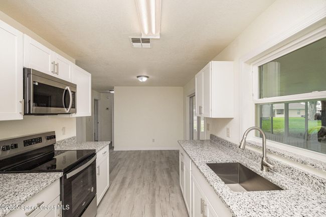 158 Billiar Ave Ne, House other with 3 bedrooms, 2 bathrooms and null parking in Palm Bay FL | Image 9