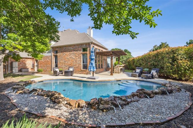 View of pool with a patio and a pergola | Image 34