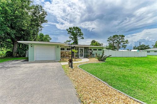 557 Reading St Nw, PORT CHARLOTTE, FL, 33952-6545 | Card Image