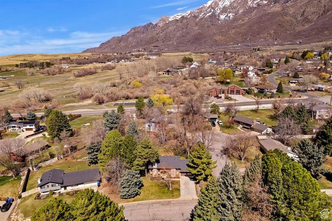Aerial view of property and surrounding area with a mountainous background and nearby suburban area | Image 41