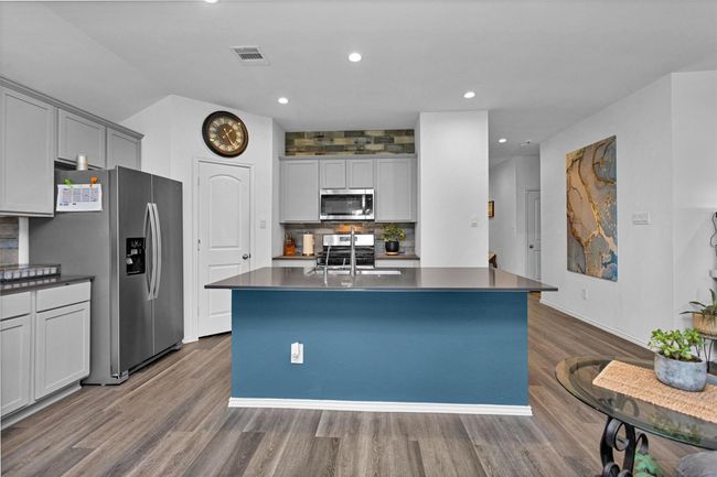 The large island is perfect for entertaining! | Image 11