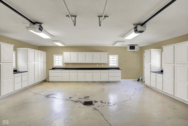 2 CAR ATTACHED GARAGE WITH EPOXY FLOORING AND STORAGE | Image 42