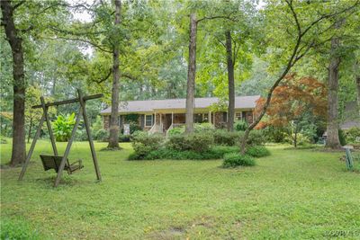 View of front facade featuring a front yard | Image 1