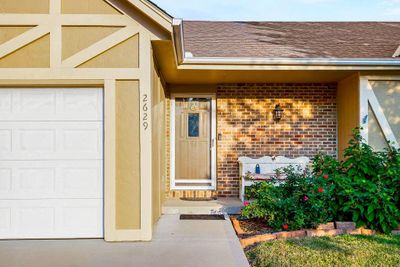 Entrance to property with a garage | Image 2