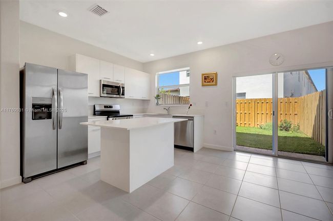 2455 Nw 119 Th Ter, Home with 3 bedrooms, 3 bathrooms and null parking in Miami FL | Image 4