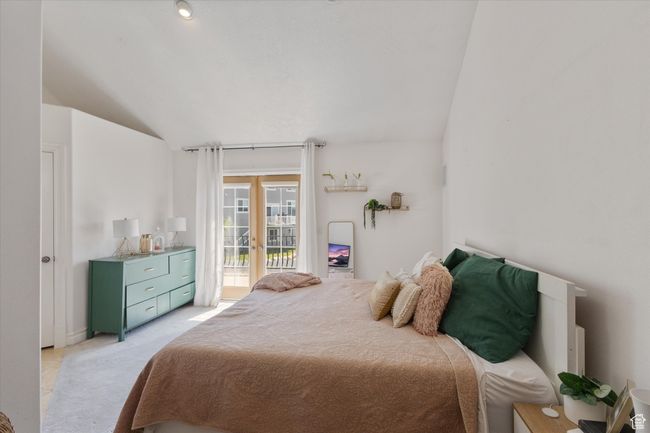 Master bedroom with access to outdoor deck and French doors | Image 13