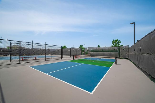 Two pickleball courts and one full size tennis court. | Image 45