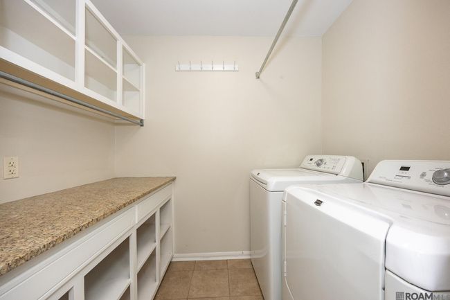 10218 N Magna Carta Pl, Townhouse with 4 bedrooms, 3 bathrooms and 2 parking in Baton Rouge LA | Image 23