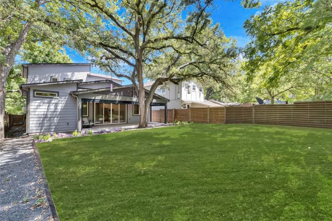 View of yard with a fenced backyard | Image 32