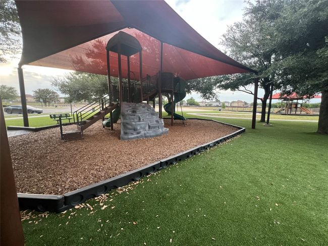 Community play area with a lawn | Image 33