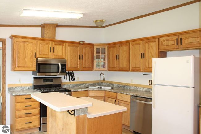 2071 Driftwood Ln Ne, House other with 3 bedrooms, 2 bathrooms and null parking in Kalkaska MI | Image 16