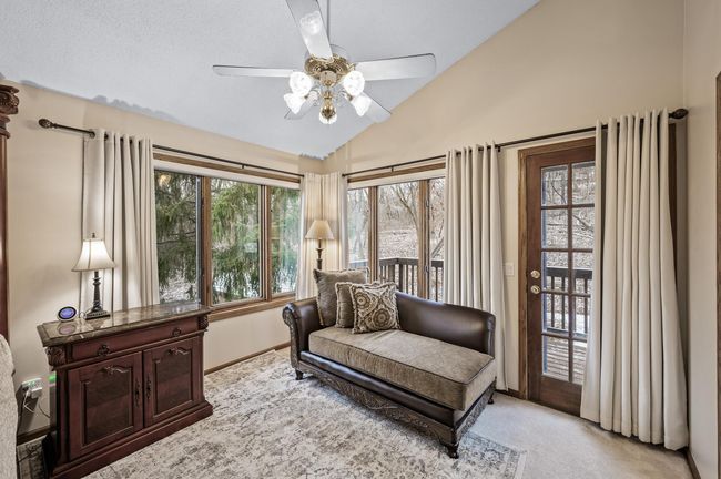 Walk out to the deck from the primary bedroom - Wonderful natural light thanks to the windows and the door! | Image 25