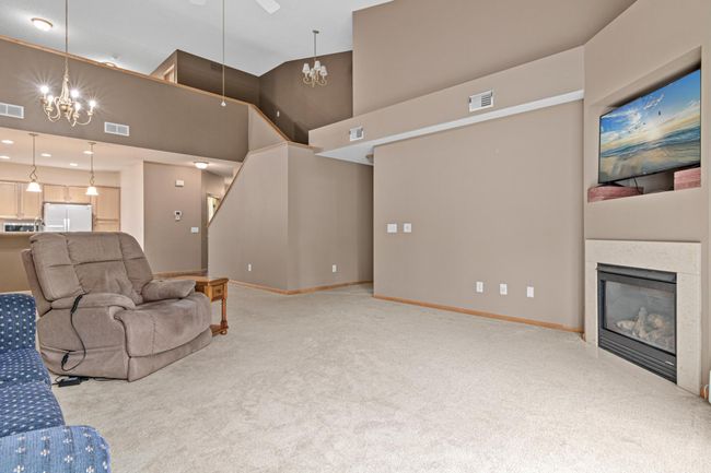 living room with gas fireplace | Image 9