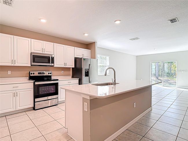 14020 Sooty Tern Ave, House other with 4 bedrooms, 2 bathrooms and null parking in WEEKI WACHEE FL | Image 9