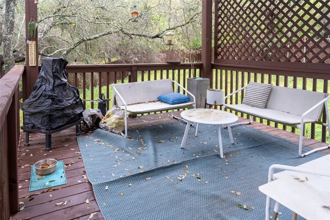 Deck featuring an outdoor hangout area | Image 35
