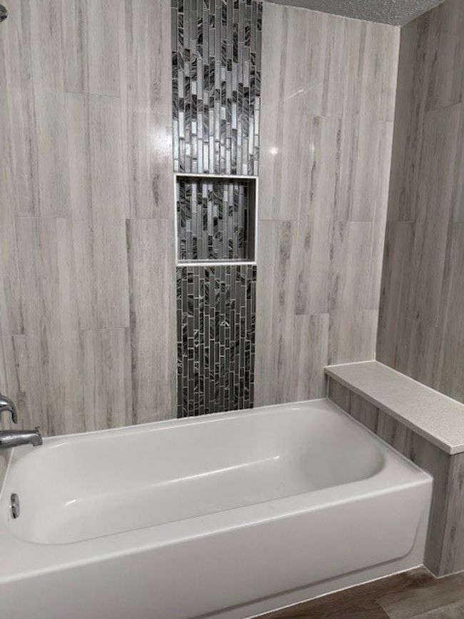 Bathroom featuring wood finished floors | Image 16