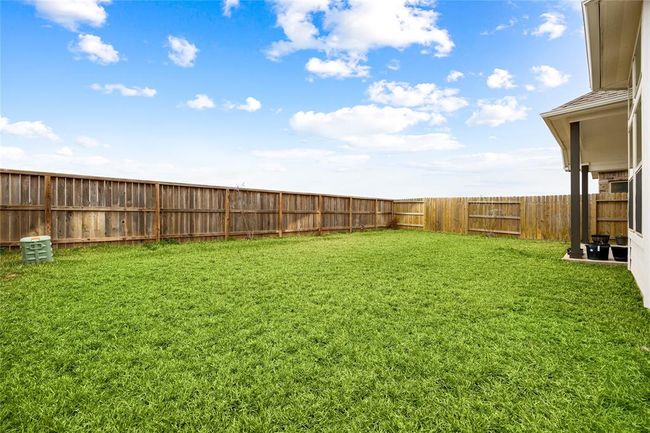 Expansive, fully fenced backyard offering a private setting and endless outdoor possibilities. | Image 22