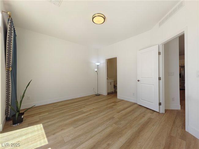 Bedroom downstairs with en-suite full bathroom | Image 18