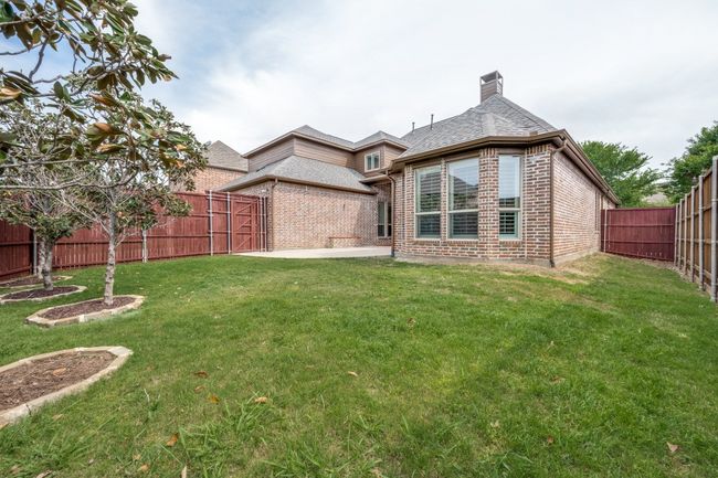Backyard with outside cook top and a fenced backyard | Image 19