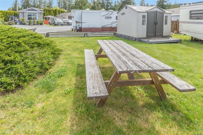 Sunny corner lot with storage shed | Image 10