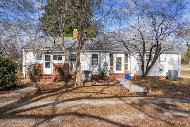 Back of duplex, 2 bedroom on left and 1 bedroom on right | Image 41