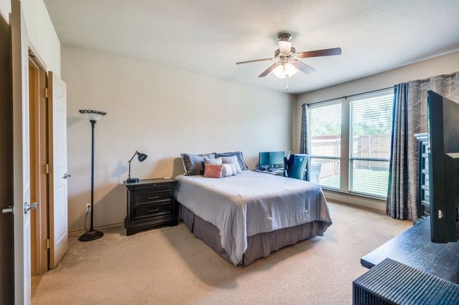 Spacious primary suite with over sized windows | Image 16