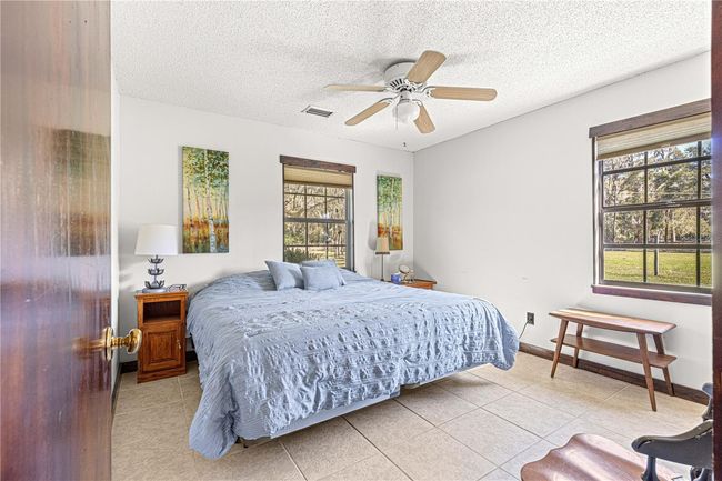 15950 Ne 50 Th St, Home with 4 bedrooms, 2 bathrooms and null parking in WILLISTON FL | Image 12