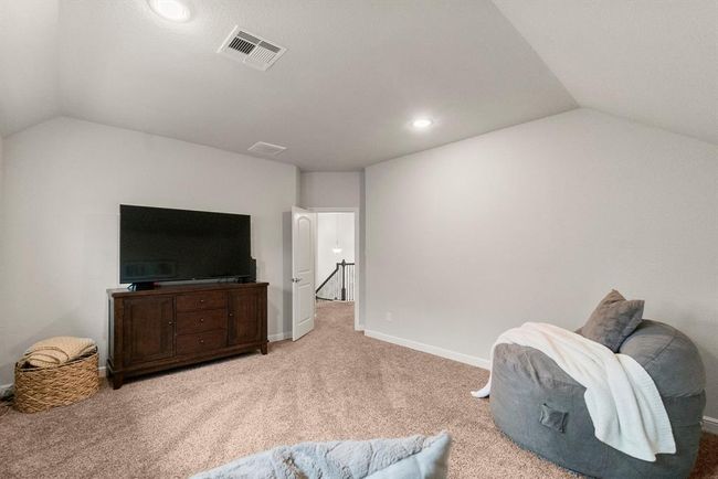 Large media room can also be used as a guest room (without a closet). | Image 22