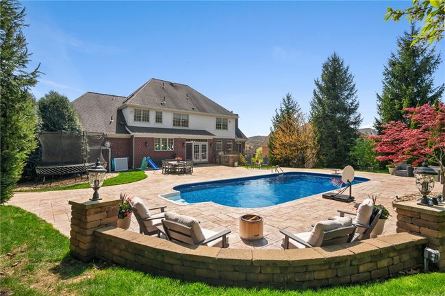 Heated salt water pool and patio area | Image 32
