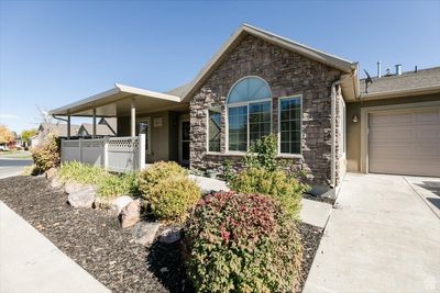 View of front of property with a garage | Image 3