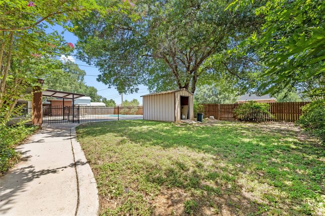 Back yard with storage building | Image 36