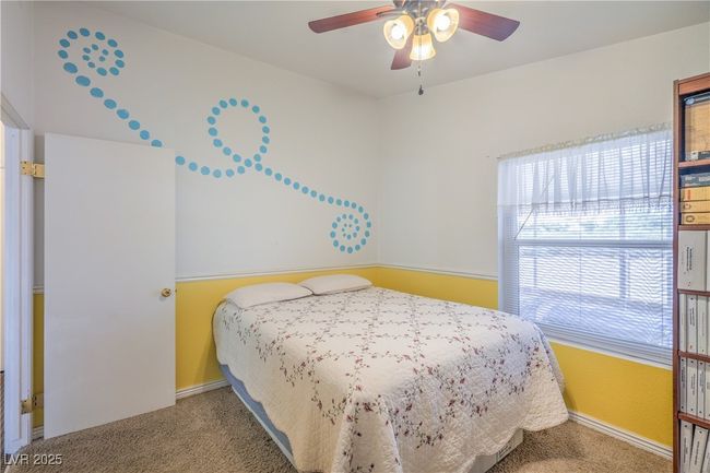 Carpeted bedroom with baseboards and ceiling fan | Image 21